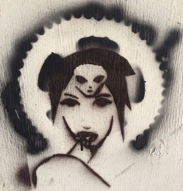 Alien-girl graffiti in San Francisco.